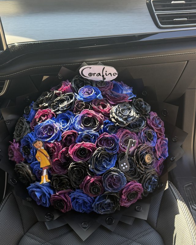 The Jones Bouquet by Blooms x Mel — Black, deep purple, and midnight blue roses with button details in a black wrap