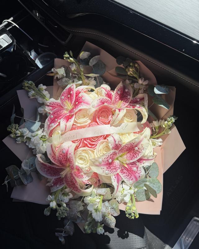 Pearl Lily Grande by Blooms x Mel — 24 white and pink roses with stargazer lilies, stock, eucalyptus, and pearl details throughout