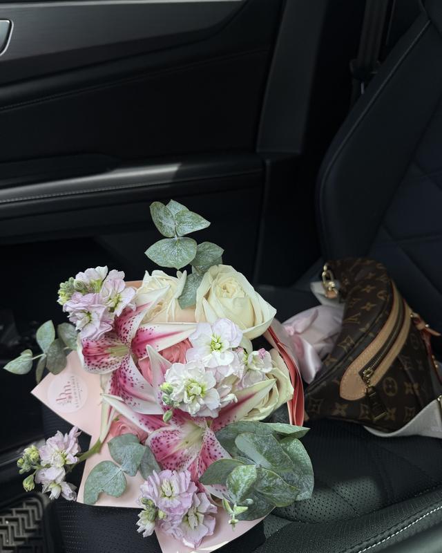 Petite Lily by Blooms x Mel — A dozen white and pink roses with stargazer lilies, white stock, and eucalyptus
