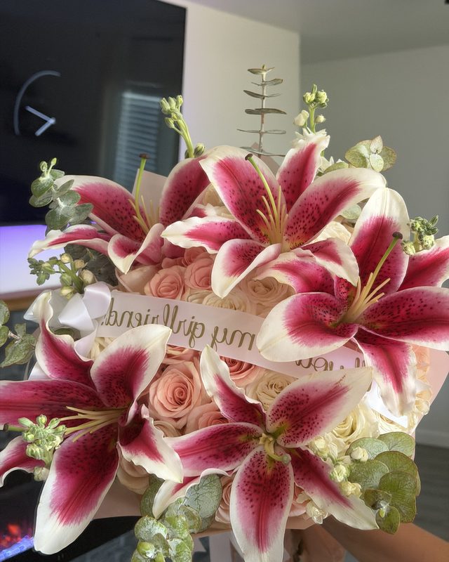 Petite Stargazer by Blooms x Mel — cream and peach roses with stargazer lilies, white stock, and eucalyptus