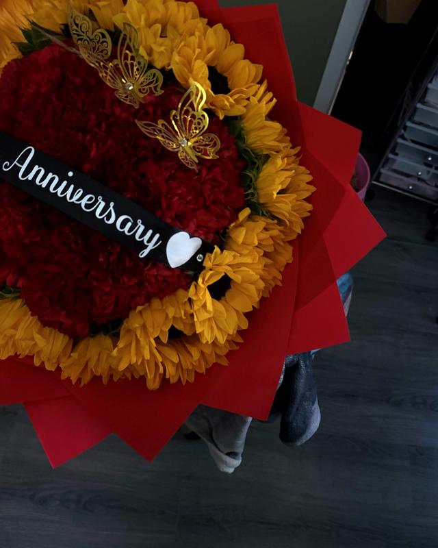Sol y Amor by Blooms x Mel — Red carnations circled in sunflowers with gold butterflies
