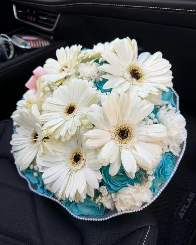 Teal Dream by Blooms x Mel — Turquoise roses with white carnations and white gerberas trimmed in pearls