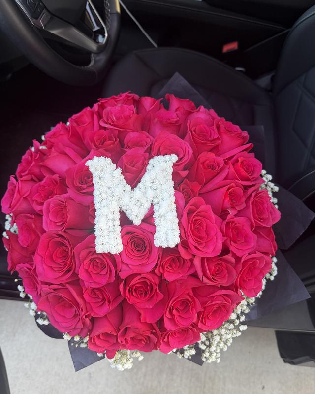The Letter by Blooms x Mel — Their initial in white blooms, set into a full rose ramo with baby's breath