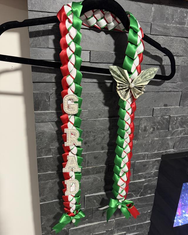 The Money Lei by Blooms x Mel — A braided ribbon lei with folded money butterflies